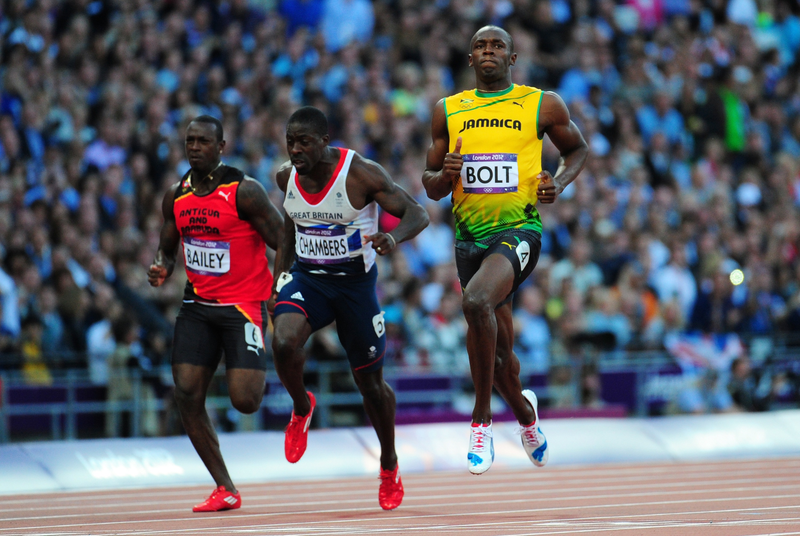 Illustration for article titled Photos Of Usain Bolt Looking Bored As He Blows Past The Best Runners In The World